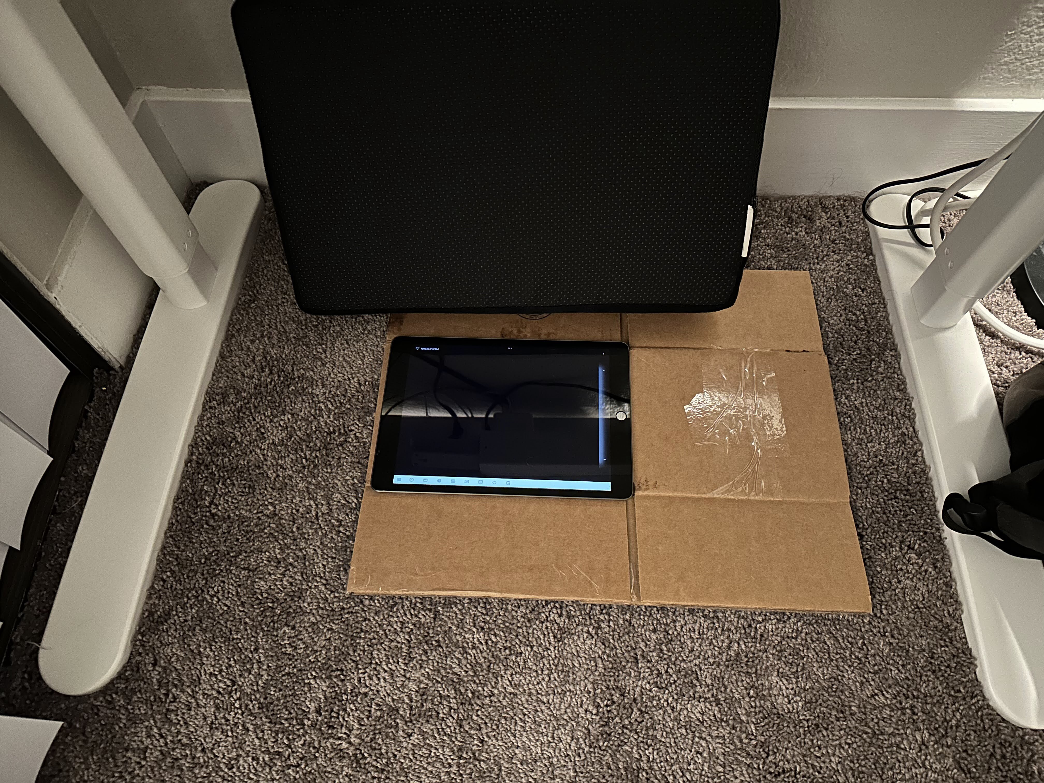 iPad is a weird thing to see under the table, but a surprisingly useful one.