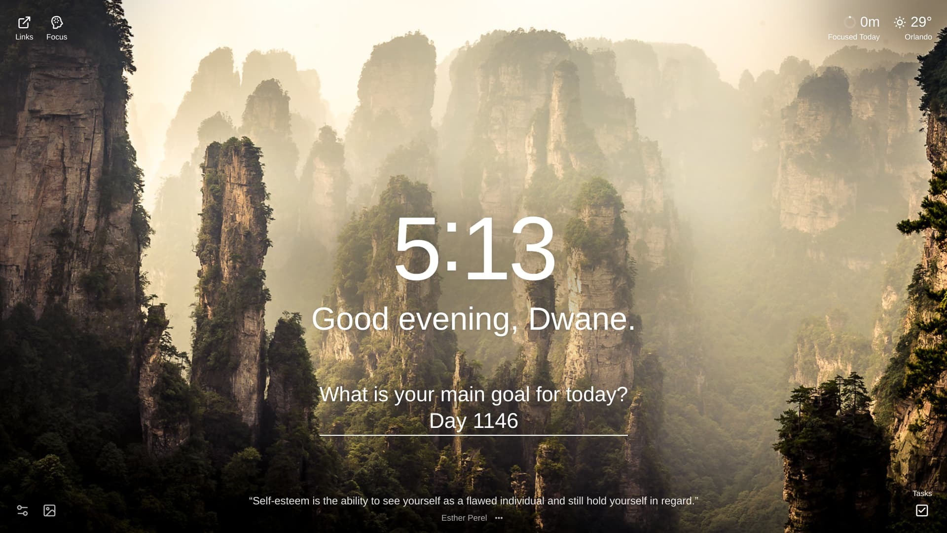 A breathtaking landscape featuring towering, mist-shrouded sandstone pillars, resembling floating mountains, rising from a lush, green valley. The location is Zhangjiajie National Park, China.