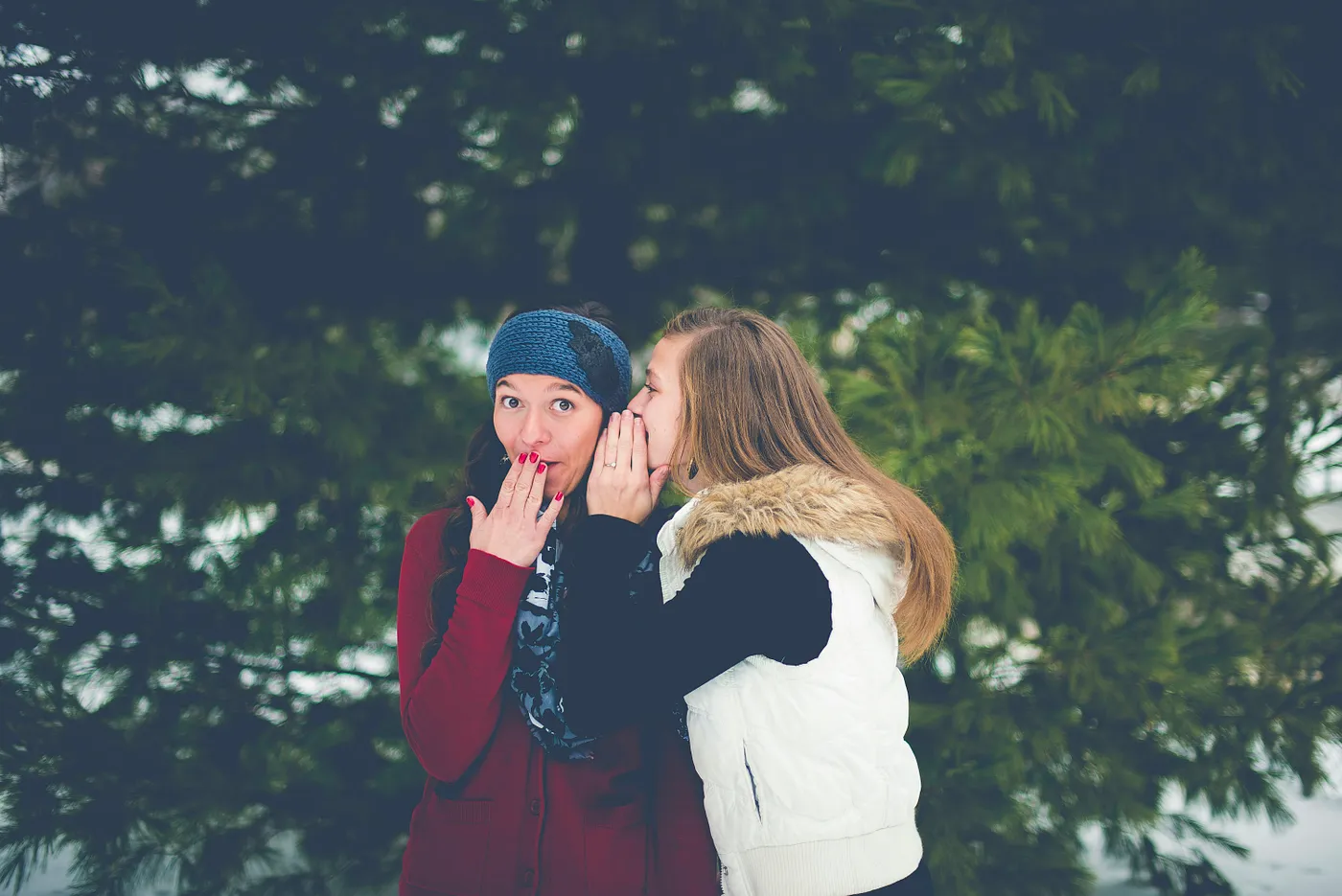 Two people gossiping - Photo by Ben White on Unsplash
