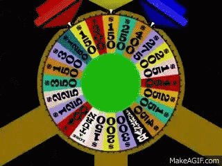 a colorful spinning wheel with a green center and the words makeagif.com below it