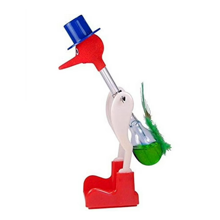 Picture of a drinky bird toy. A toy with the shape of a bird with long legs, wearing top hat and boots that leans up and down showcasing perpetual motion (motion not depicted in this static image)