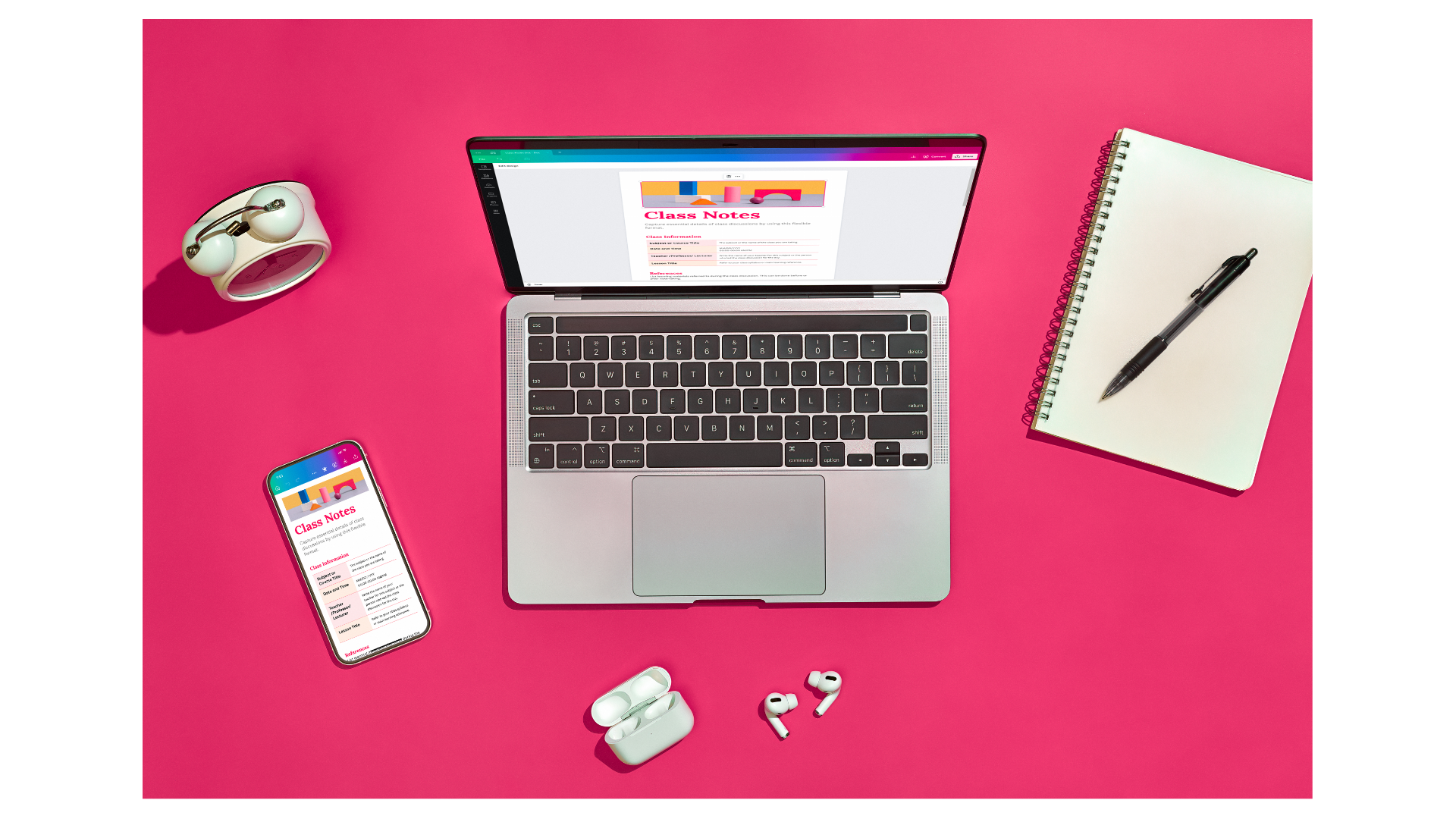 Laptop with neon pink background