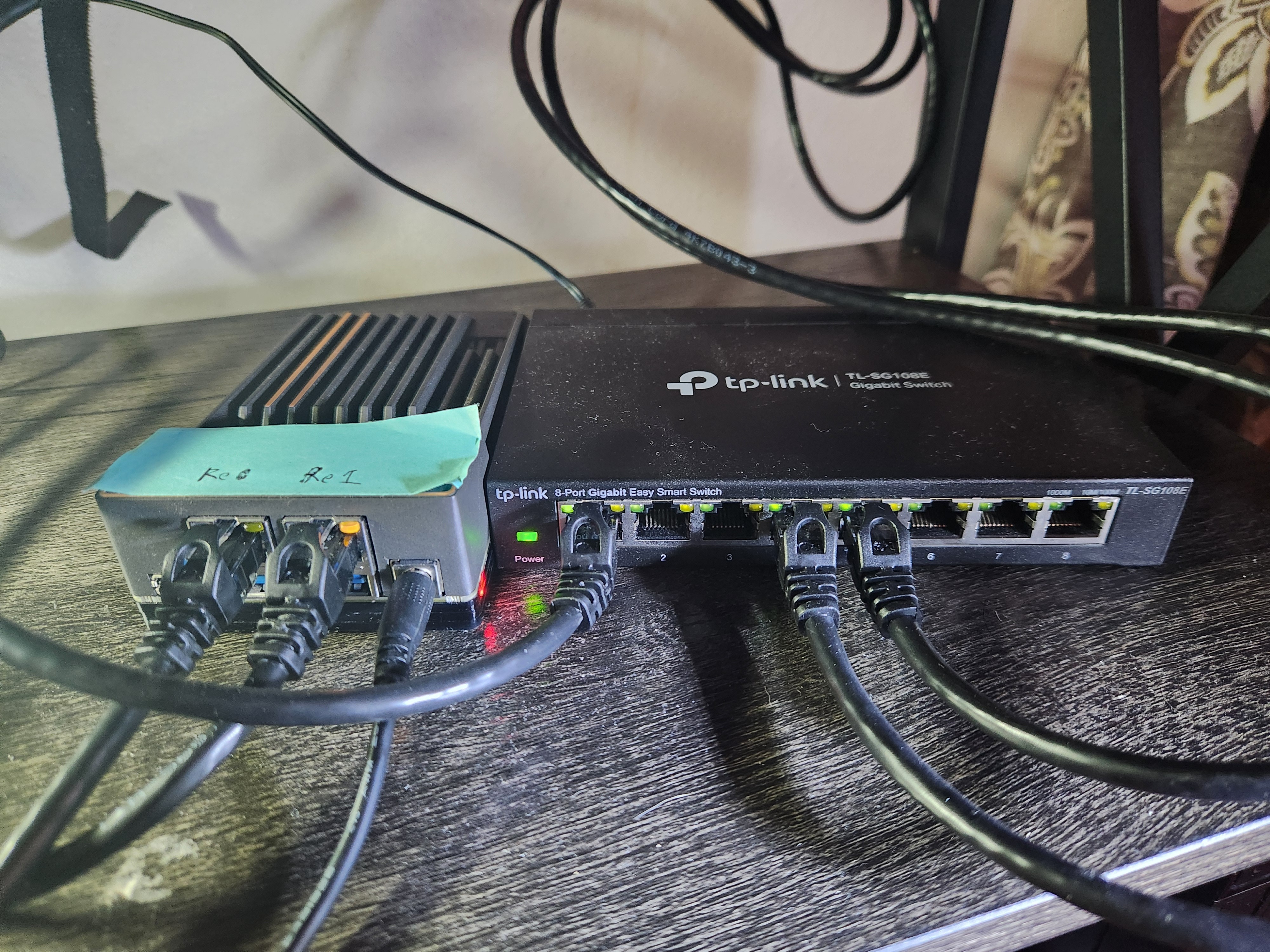 Image of the Zimaboard connected to the switch and the WiFi extender