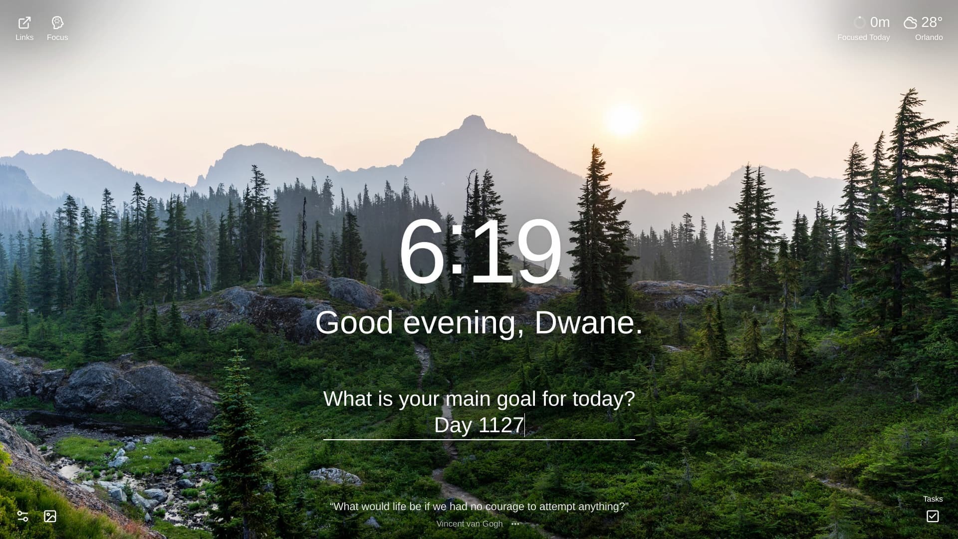 A tranquil mountain landscape featuring a lush green valley filled with evergreen trees and rocky outcroppings, leading to a silhouetted mountain range against a soft sunset sky with a faint sun visible. The time 6:19 is displayed in the center. The location is Rampart Lakes, Washington, United States.
