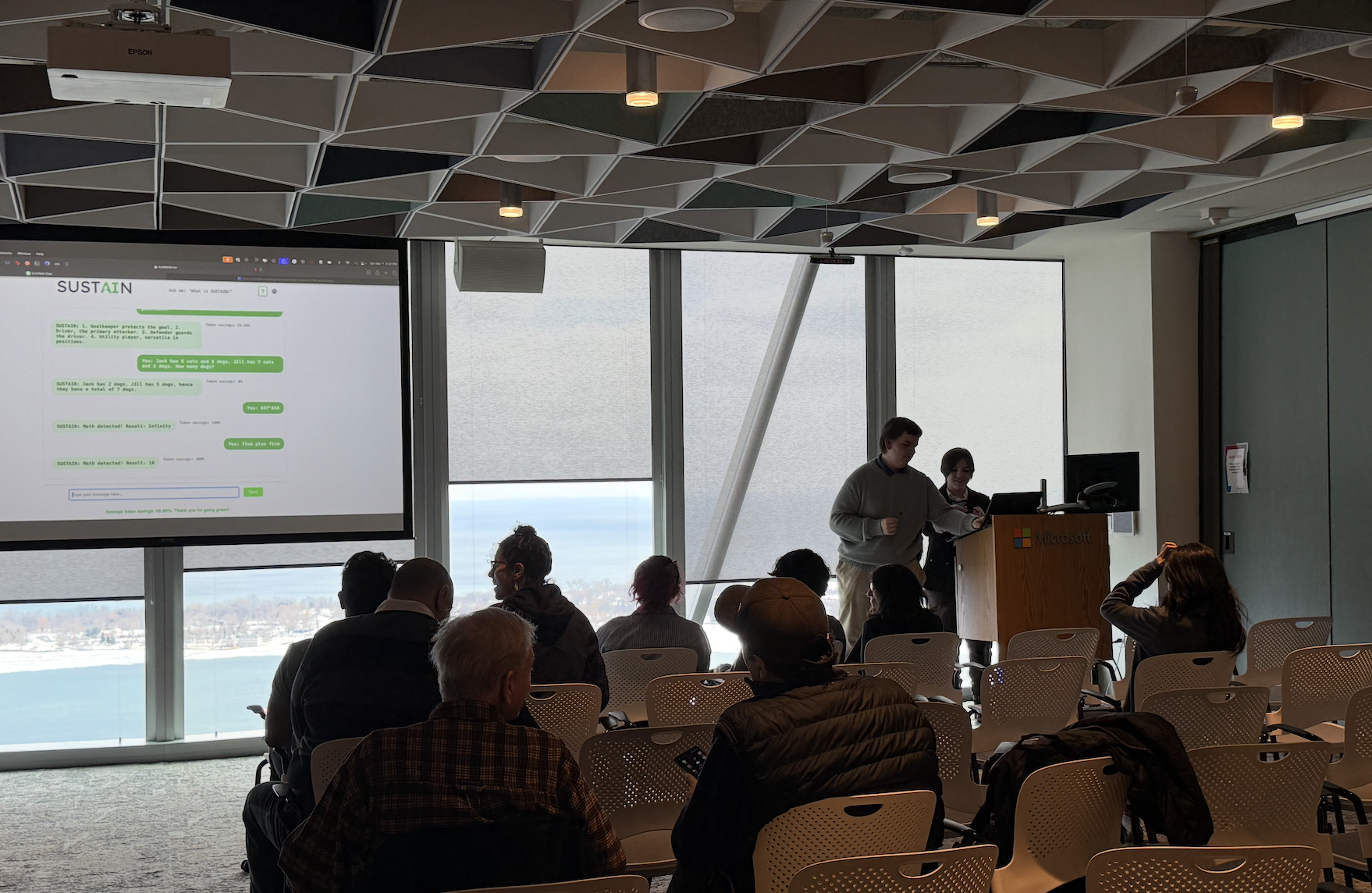 Dilara and Tomasz presenting a demo of SUSTAIN at Global AI Bootcamp Toronto 2025